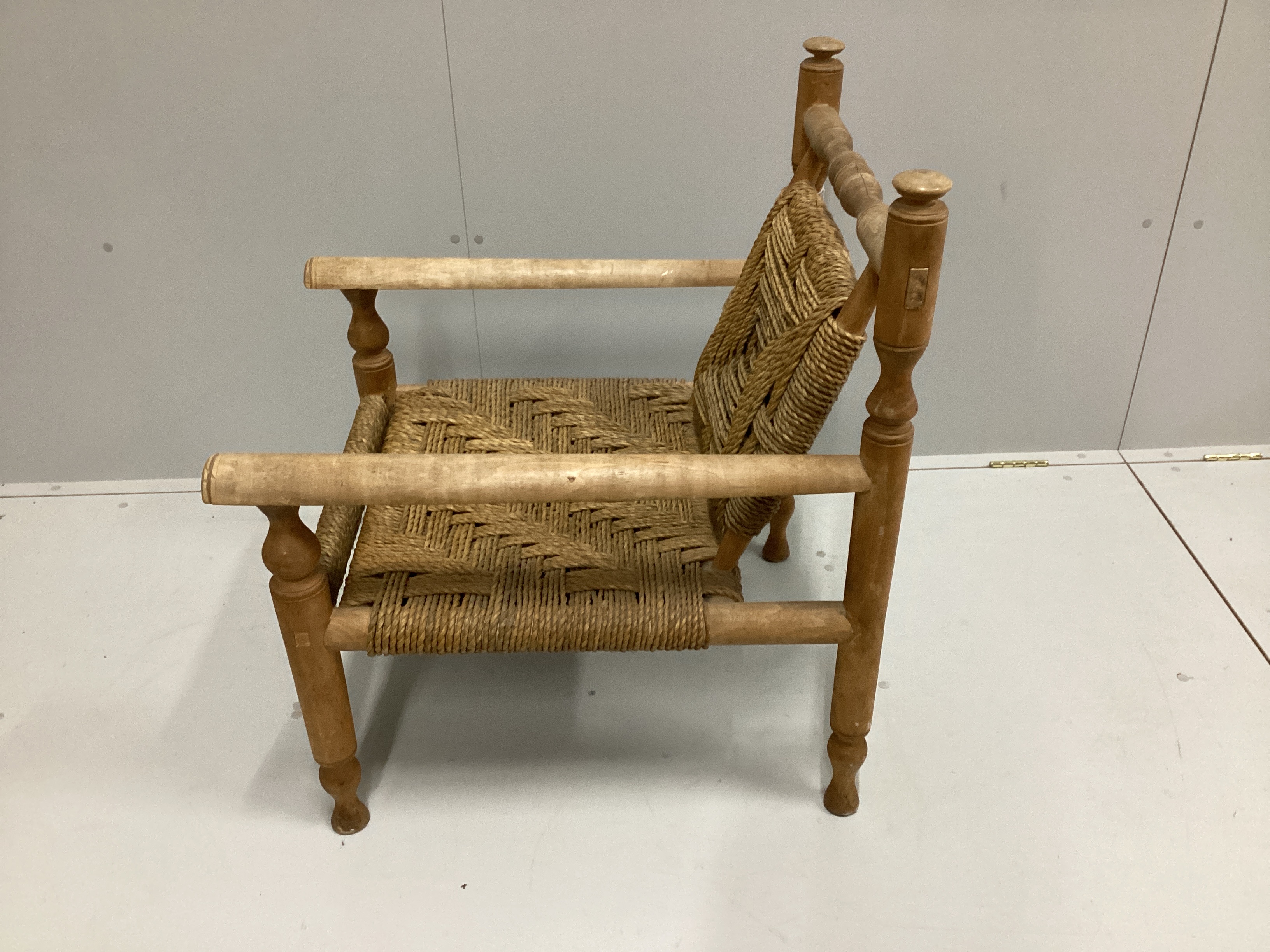 In the manner of Adrien Audoux and Frida Minet, a sisal weave beech elbow chair, width 60cm, depth 74cm, height 84cm